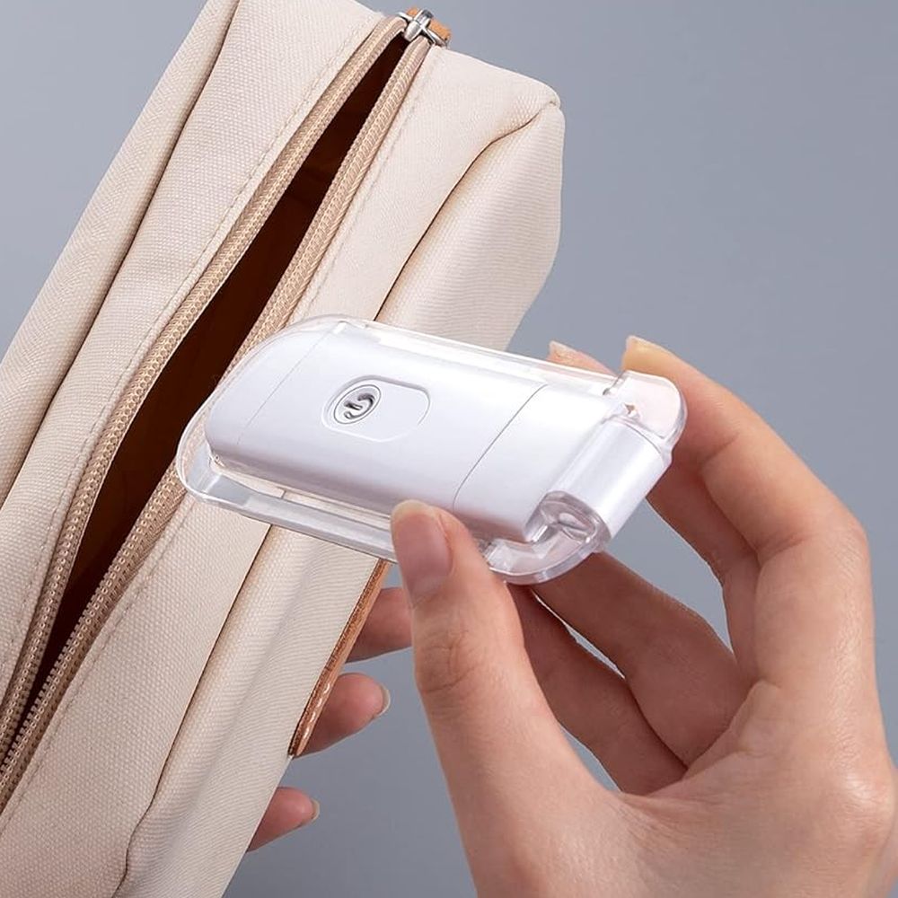 DEWENWILS compact book light folded flat and slipped into a travel pouch