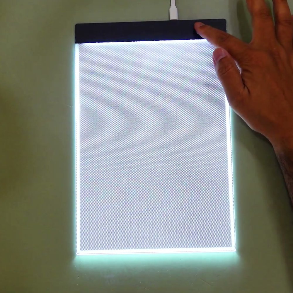 Real photo of the LED tracing pad lit up in the Gadget Hunting with RR review