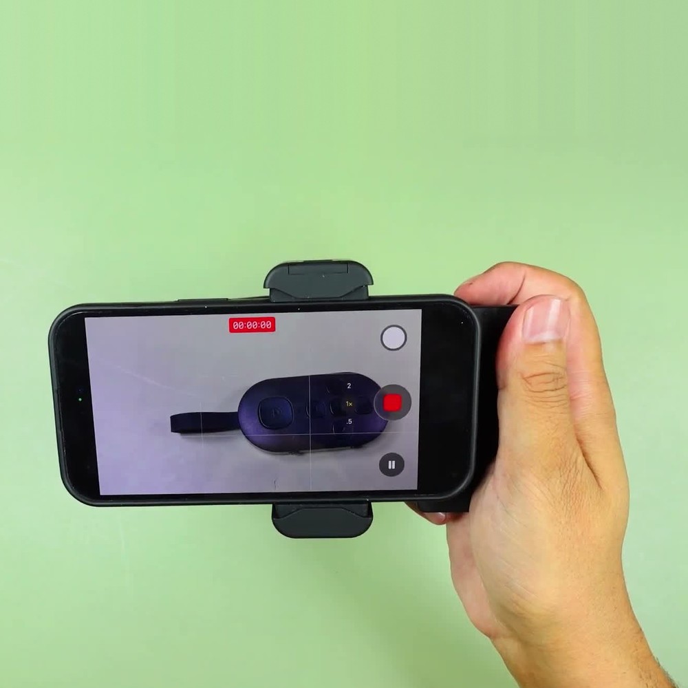 Real Desiontal PH-30B clip grip holding an iPhone sideways while recording video
