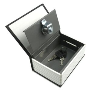 Dictionary book safe opened to show the metal lock box and keys