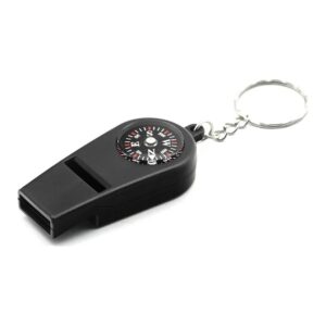 Black plastic survival whistle with a built-in compass dial on top and a split key ring, on white
