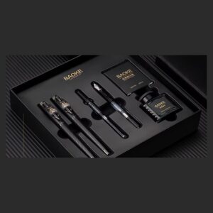 Open black BAOKE gift box holding four fountain pens, a boxed ink bottle and a spare cartridge pack in fitted foam