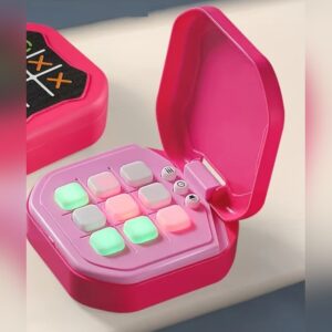 Pink handheld digital tic tac toe puzzle game console open, showing the lit grid screen