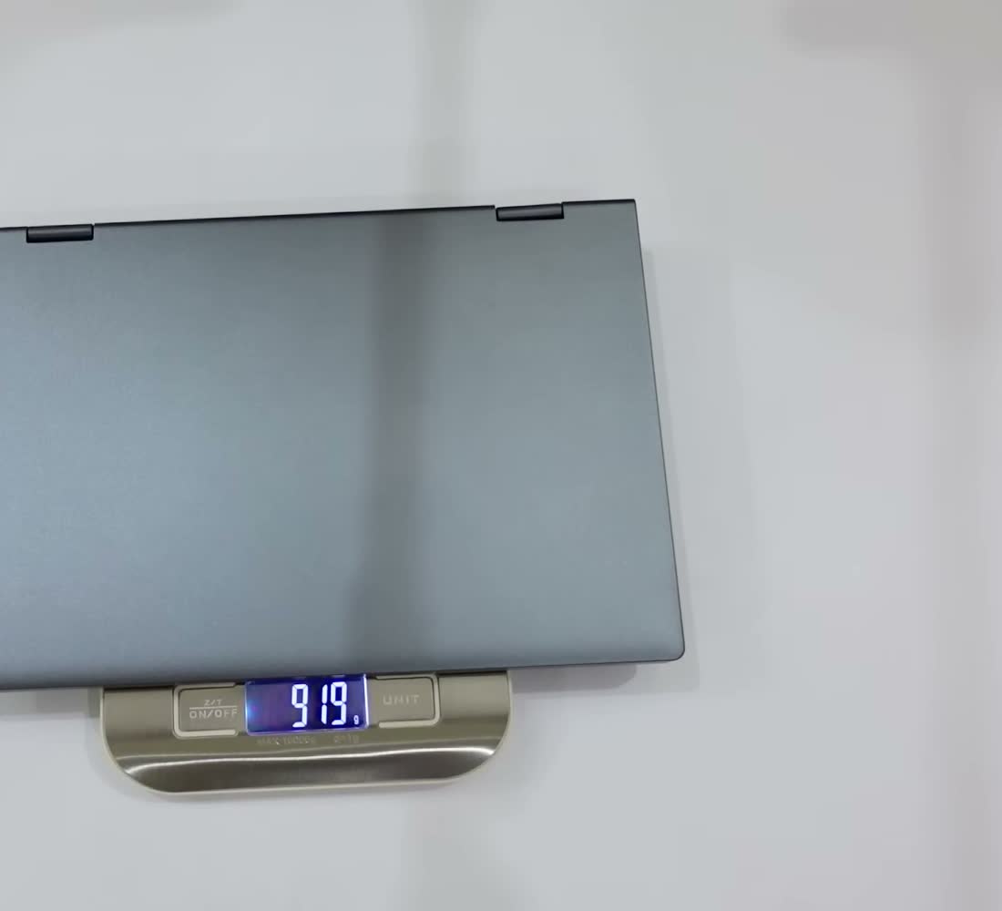 The MiniBook X weighed on a kitchen scale during the review, reading 919 grams