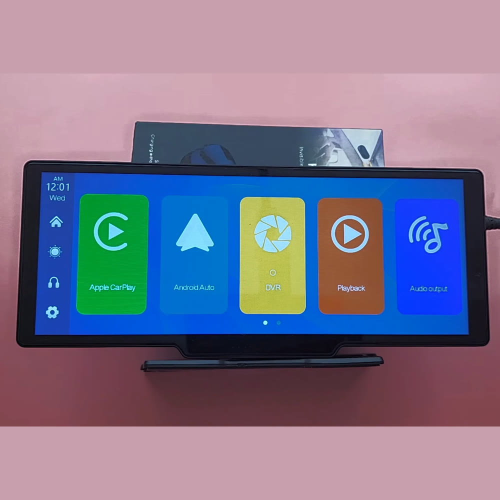 PODOFO A3073 car screen standing on its dash mount, its 9.3-inch display showing the Apple CarPlay, Android Auto, DVR, Playback and Audio output tiles