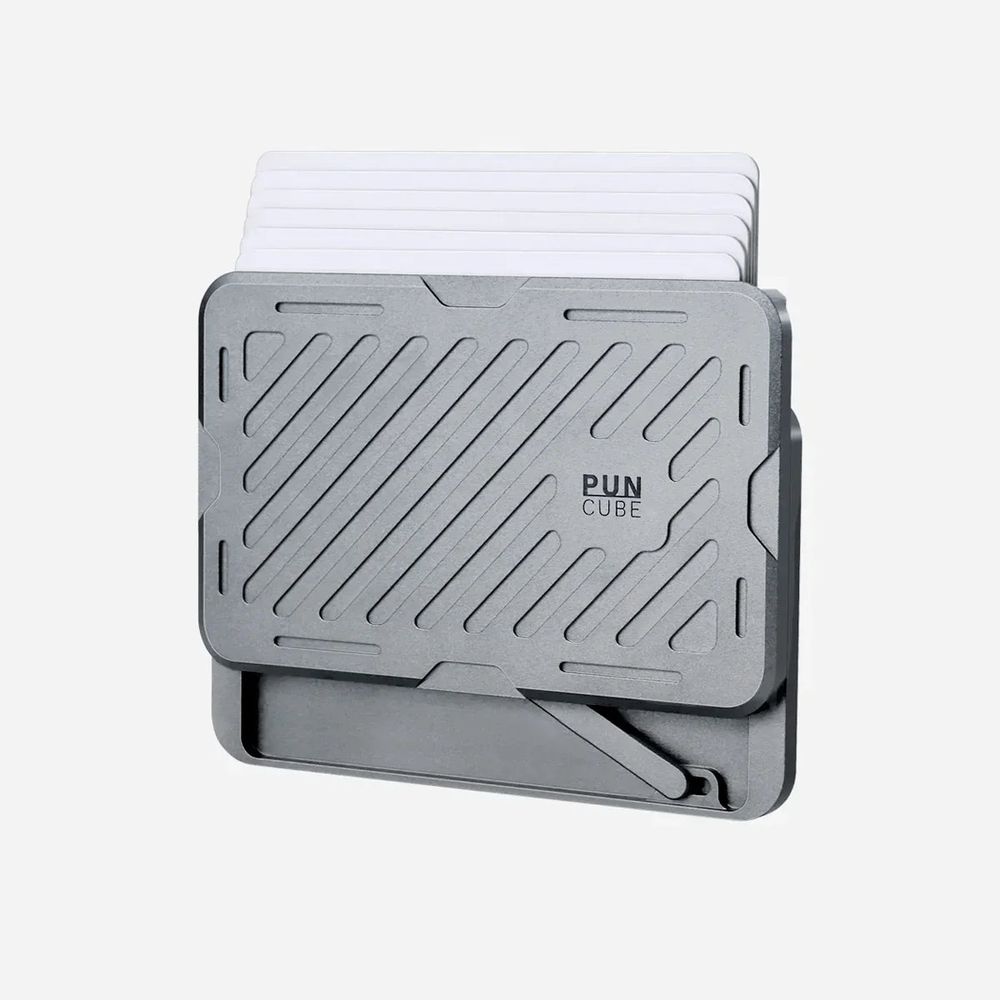 PUNCUBE Mech Wallet in gray with cards fanned out