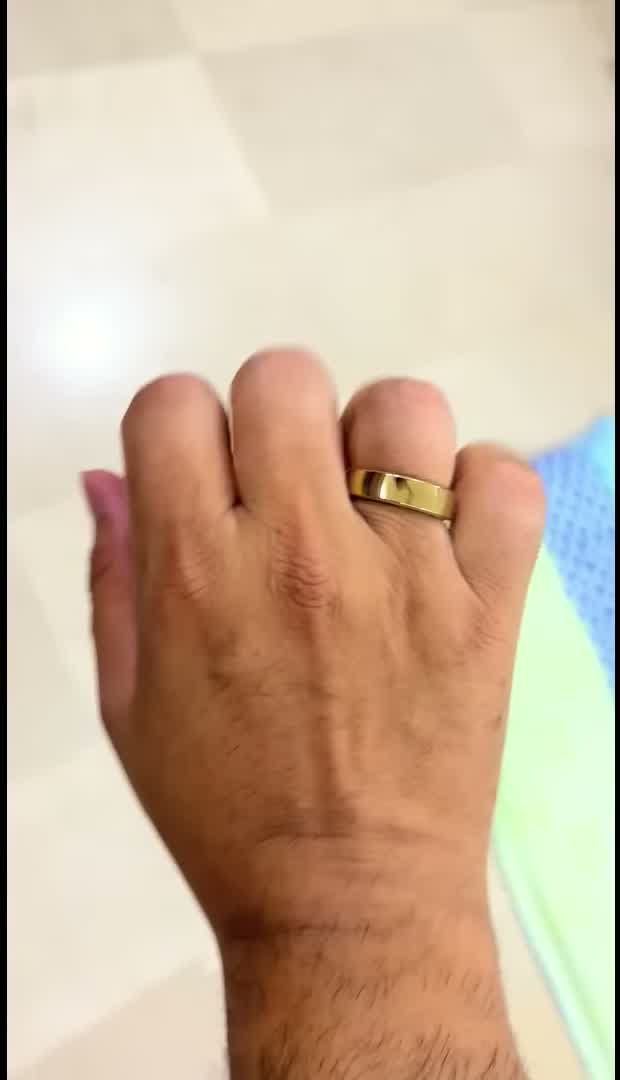 RingConn Gen 3 smart ring worn on a finger, showing how the royal gold band sits on the hand